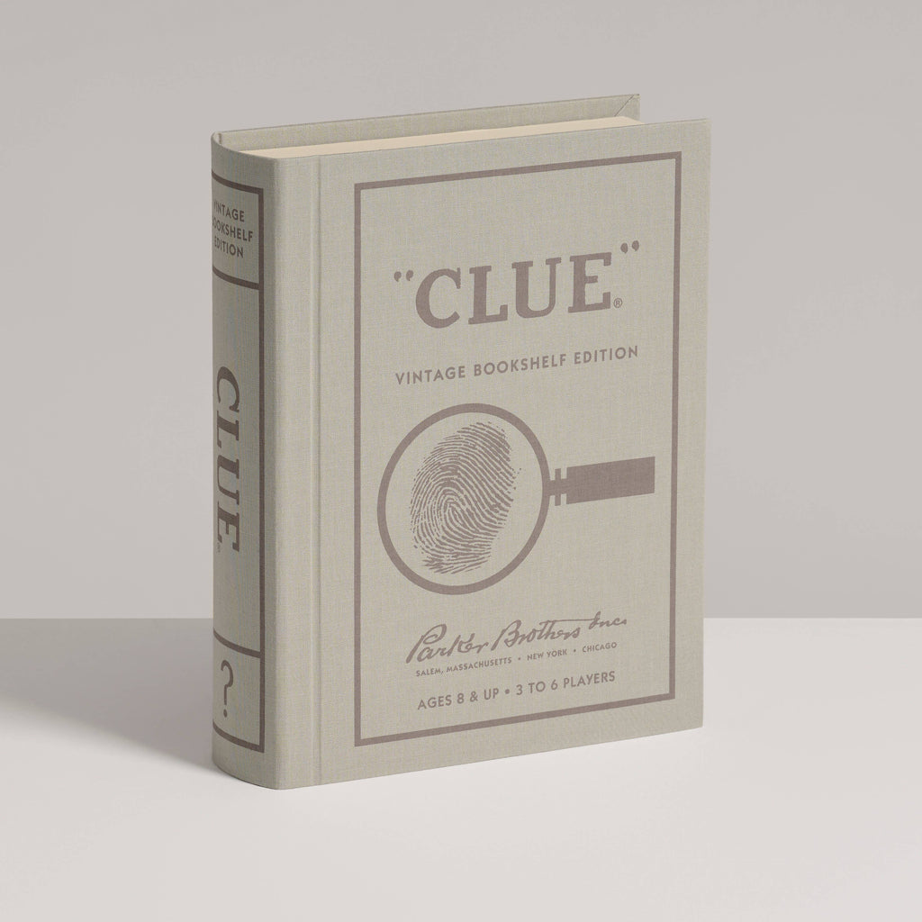 The Clue Vintage Bookshelf Edition comes in a beige box styled like a hardcover book, featuring a magnifying glass and fingerprint—ideal for crime solvers who value premium game components.