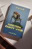 A hardcover collector’s edition of "1984 George Orwell" rests on a white surface. The cover shows a vintage TV casting a shadow, alluding to the novel’s dystopian themes, with "Wordsworth Editions" printed below.