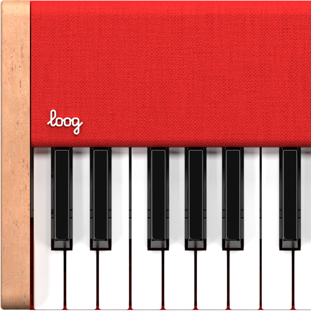 Close-up of the Loog Piano, a portable digital instrument with eight velocity-sensitive black and white keys, red top panel, wooden sides, and the white "loog" logo displayed on its red surface.