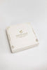 A cream-colored box with gold accents holds a hand-painted wooden Sabo Concept Christmas Ornaments set, featuring ballerina decorations, shown against a white background.