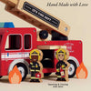 The Wooden Toy Fire Engine & Characters is a charming retro red wooden truck with an extending ladder, two firefighter figures (one with a medical bag), illustrated flames, and "Hand Made with Love" text—crafted sustainably.