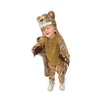 A young child smiles while wearing Costume - Leopard, a faux fur animal outfit featuring a hood, paws, and tail, standing against a white background.