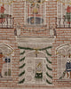 Coral & Tusk Holiday House Advent Calendar featuring an embroidered linen brick house facade filled with festive animals, including owls on a mantelpiece and a party-hat-wearing dog at the front door.