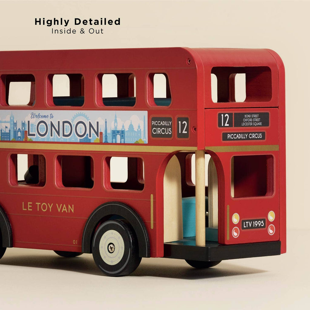 The London Wooden Bus is a detailed red wooden toy featuring “Welcome to London” and “Piccadilly Circus” signs, open doors, and "LE TOY VAN" on the side—an ideal early learning toy shown against a plain background.