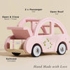 Sophie's Dolls House Toy Car: A pink retro wooden car with 2 seats, open roof, working boot/trunk, and suitcase included. “Hand Made with Love.” A delightful educational toy for little hands.