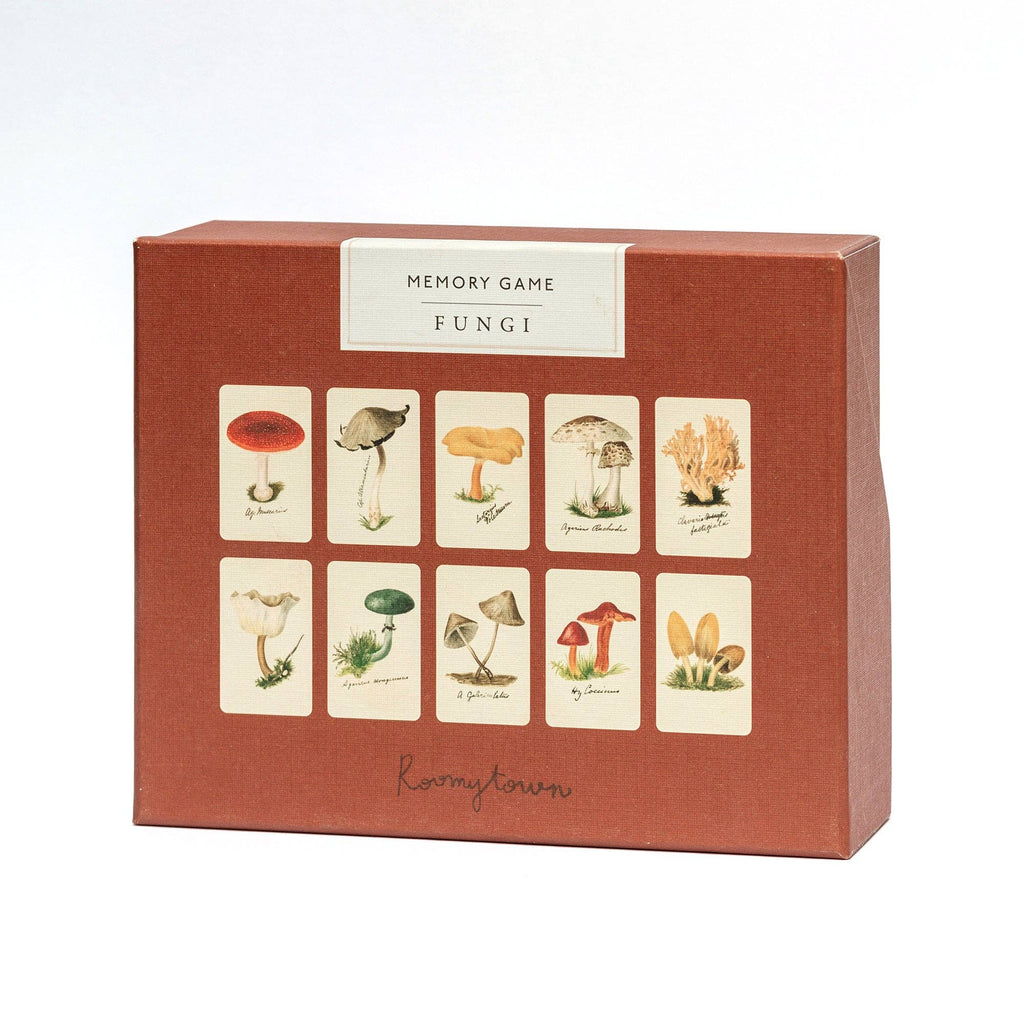 The "Memory Game - Fungi" comes in a red box with vintage fungi illustrations—red, yellow, white, and coral-shaped species—each labeled with its scientific name for a fun and educational memory matching game.