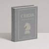 Chess Vintage Bookshelf Edition is a gray book-shaped box with a white knight chess piece on the cover. This collectible strategy game is for 2 players, ages 8 and up.