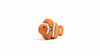 The Handmade Holzwald Clownfish, a small orange and white wooden toy with black stripes, is displayed on a white background, highlighting the charm of Holzwald toys.