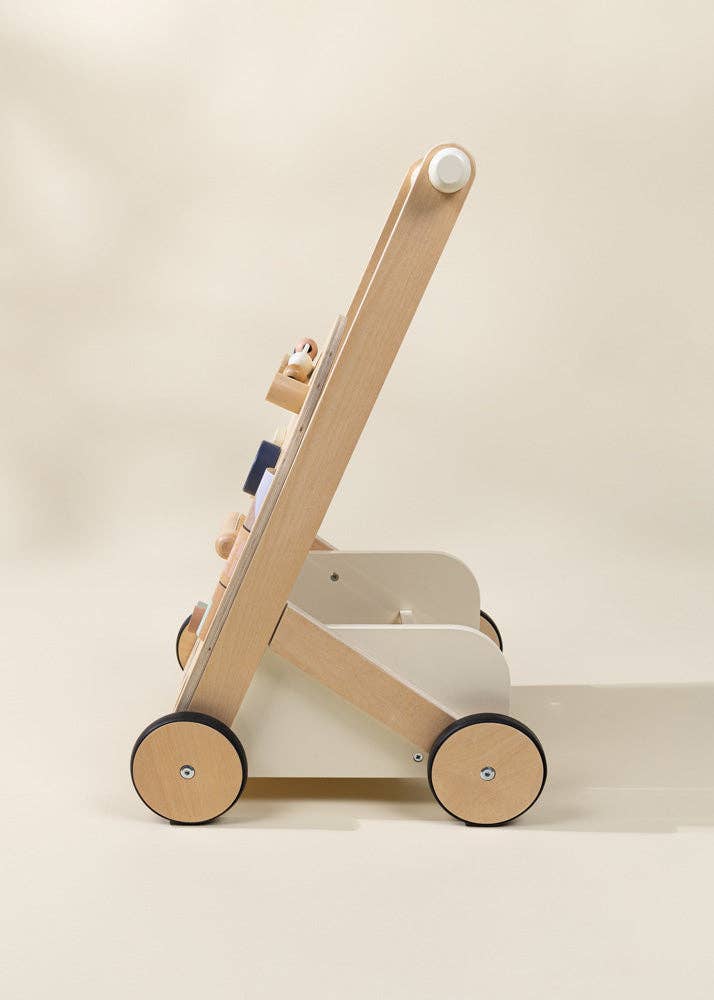 The Wooden Activity Walker, featuring a simple, minimalist design and four black wheels, is pictured in a side view against a neutral background.
