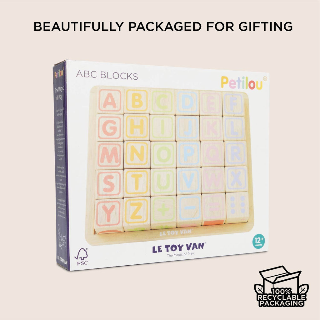 ABC Learning Blocks (ships in one week) by Le Toy Van: colorful wooden alphabet blocks for ages 12+ months. Beautifully packaged for gifting with 100% recyclable packaging. Perfect for toddler learning and development.