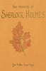 The cover of "The Memoirs of Sherlock Holmes | Collector's Ed. | Hardcover" by Arthur Conan Doyle features an illustration of an orange and red oak leaf on a vivid yellow-orange backdrop.