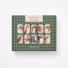 A green patterned box labeled "Memory Game - Animal Kingdom" features vintage animal illustrations—zebra, giraffe, lion, cheetah, owl, monkey, and bear—in a grid layout, emphasizing this classic matching game.