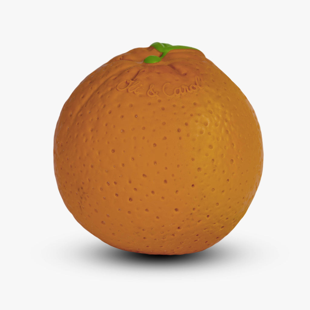The Orange Baby Ball is a natural rubber sensory toy with a textured surface and a green spot on top, realistically resembling an orange fruit—perfect for babies’ playtime.