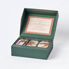 The Memory Game - Animal Kingdom comes in a green box with three stacks of cards and the lid open to reveal printed "Memory Game Instructions." Vintage animal illustrations appear on the top cards of this charming matching game.