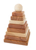 The Natural Square Pyramid Stacker is a wooden stacking toy made from FSC certified wood, featuring natural-toned squares in different sizes stacked in a pyramid and topped with a round wooden ball.