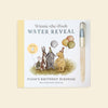 Winnie-the-Pooh: Pooh’s Birthday Surprise (Water Reveal) activity book featuring illustrations of Piglet, Rabbit, and Eeyore holding balloons, with a water pen attached to the side.