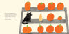 A black cat and a small squash sit among pumpkins on wooden shelves, inspired by Stumpkin by Lucy Ruth Cummins, where one stemless jack-o’-lantern sensed something was very wrong.