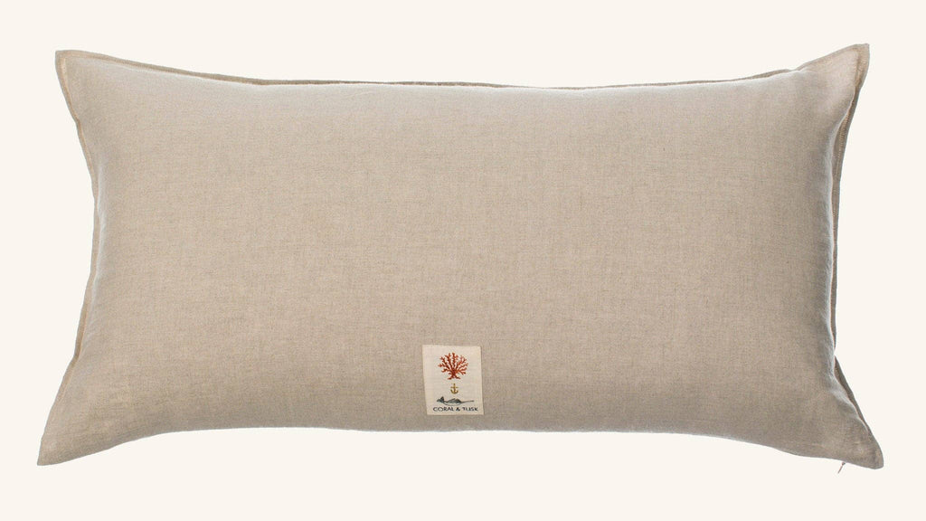 Coral & Tusk Christmas Cheer Lumbar Pillow in rectangular beige woodland style, featuring a small branded fabric patch centered on the front.