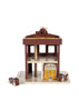 Konges Sloejd - Wooden Fire Station made of FSC-certified wood, featuring two small toy fire trucks and a helicopter on the roof.