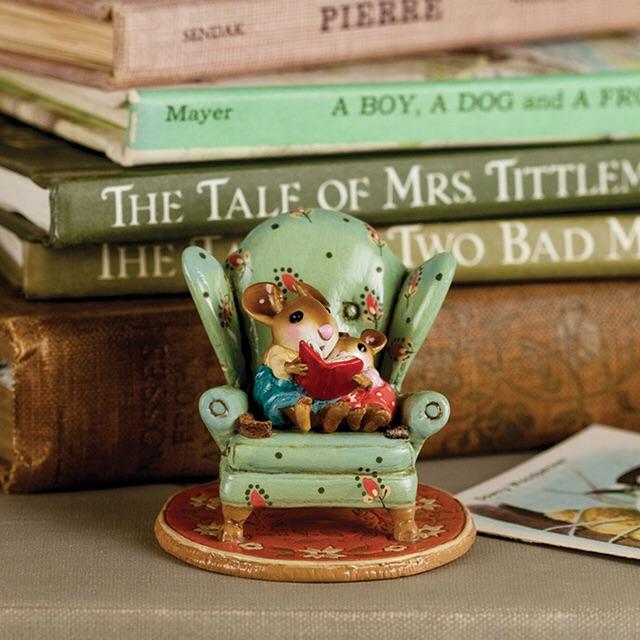 The Wee Forest Folk Tiny Collectible - Sharing A Story features two hand-sculpted mice reading together on a green floral chair, with vintage books like "The Tale of Mrs. Tittlemouse" stacked behind. Not a toy.
