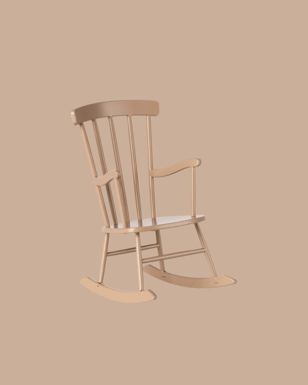 A PRE-ORDER: Rocking Chair, Miniature - Dark Sand (Estimated Ship Date: Early August) is centered against a solid beige background.