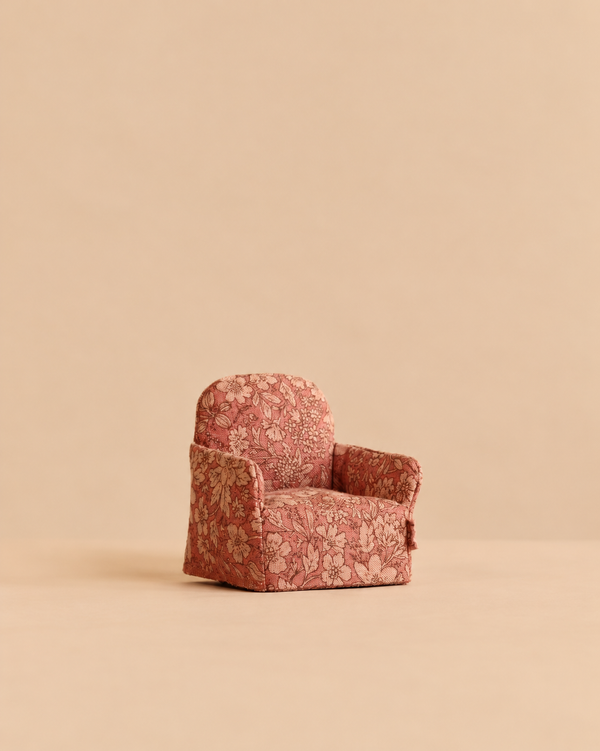 Maileg Folding Chair, Mouse - Flower, a miniature armchair upholstered in pink floral fabric.