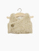 The Minikane Doll Clothing | Babies – Terry Sleeveless Vest - Beige is a textured, cream-colored, sleeveless vest with two front buttons—ideal for Minikane dolls or baby doll clothes collections. Displayed on a wooden hanger against a white background.