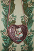 Konges Sloejd Tut Kitty Shoulder Bag in glittery pink, shaped like a heart and featuring an embroidered kitten sitting in a dessert glass.