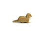 Handmade Holzwald Small Otter figurine crafted from wood in a resting position as a sustainable toy.