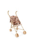 Konges Sloejd Sparkly Doll Stroller - Cherry Sequin with a sparkly pink, sequined seat featuring a cherry pattern, double wheels, and a light-colored frame.