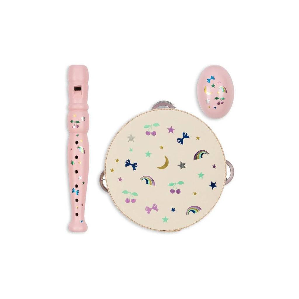 Konges Sloejd Music Set Petite - Rainbow Twinkle featuring a wooden pink flute, tambourine, and egg shaker decorated with colorful rainbows, stars, moons, bows, and cherry motifs.