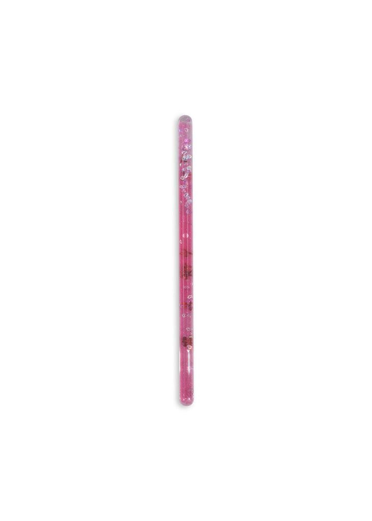 The Konges Sloejd Magical Glitter Wand - Cherry is a pink pen with floating decorations, resembling a magical wand, displayed vertically on a plain white background.