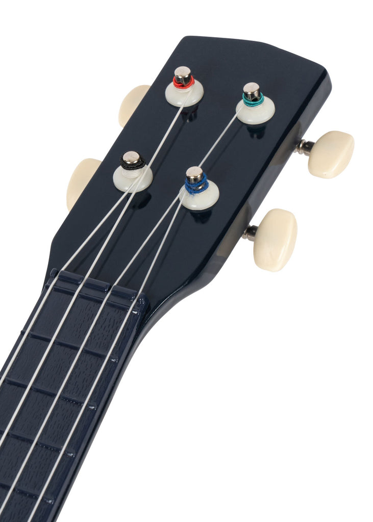 Close-up of the Konges Sloejd Wooden Ukulele - Midnight: FSC-certified dark blue headstock with four white tuning pegs, colored string windings, and part of the fretboard with its 4 strings.