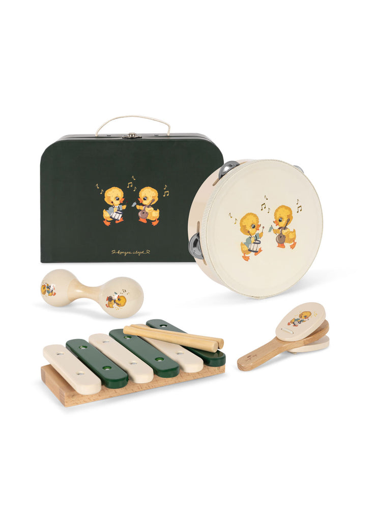 The Konges Sloejd Music Set - Green includes a tambourine, maracas, castanets, and xylophone with duckling designs. Comes in a matching green case—perfect wooden musical toys for kids.