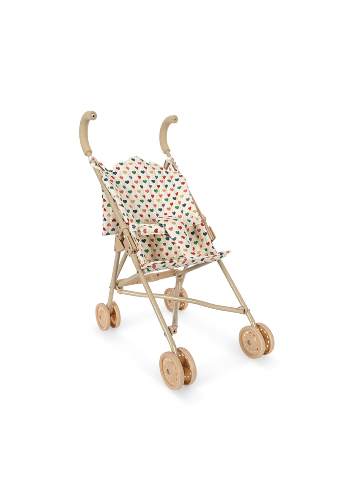 Konges Sloejd Doll Stroller - Colored Hearts with curved handles, removable heart print fabric seat, four sets of double wheels, and a simple, lightweight frame.