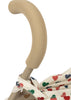 Close-up of the Konges Sloejd Doll Stroller - Colored Hearts, featuring a beige foam handle, sturdy double wheels, and removable fabric with a colorful heart pattern.
