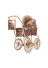 Konges Sloejd Mini Doll Pram - Sparkly Cherry Sequin, a vintage-style doll pram covered in sparkly copper sequins with a cherry print, featuring a matching small bag hanging from the handle.