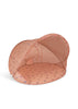 The Konges Sloejd Lace Pop-Up Beach Tent UPF 50+ is a collapsible, peach-colored pet tent with a curved canopy and multicolored paw prints, offering UV protection, shown on a white background.
