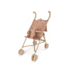 Konges Sloejd Doll Stroller - Cherry Blush in pink with a cherry print, featuring a foldable frame and four sets of double wheels.