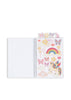 An open A5 notebook from the Konges Sloejd My Stationery Box - Unicorn, featuring a sheet of whimsical stickers with a unicorn, rainbow, butterflies, and stars.