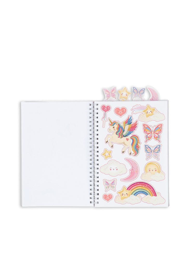 Konges Sloejd My Stationery Box - Unicorn A5 spiral-bound notebook featuring a page of unicorn, butterfly, moon, star, and rainbow stickers alongside glitter gel pens.
