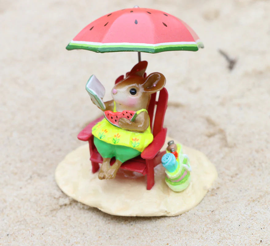 The Wee Forest Folk Tiny Collectible - Perfect Beach Day! features a hand-sculpted mouse on a red chair under a watermelon umbrella, holding watermelon with drink and towel on the sand—a delightful summer scene.