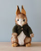 Bunny stuffed animal with green jacket