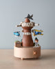 Wooden music box with airplanes going around