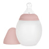 A Medical Grade Silicone Baby Bottle with a pink cap and measurement markings in both milliliters and ounces, isolated on a white background.